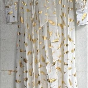 Chic White Dress with Gold Feather Pattern
